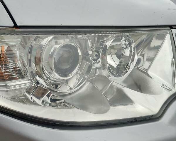 Сірий Міцубісі Паджеро Спорт, об'ємом двигуна 2.48 л та пробігом 85 тис. км за 16000 $, фото 32 на Automoto.ua