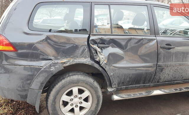 Сірий Міцубісі Паджеро Спорт, об'ємом двигуна 2.5 л та пробігом 38 тис. км за 8500 $, фото 4 на Automoto.ua