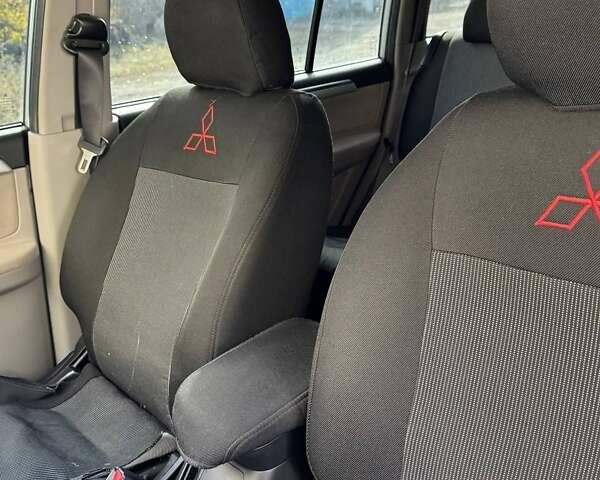 Міцубісі Паджеро Спорт 2012 у Криничках на Automoto.ua Сірий Міцубісі Паджеро Спорт, об'ємом двигуна 2.48 л та пробігом 177 тис. км за 19999 $, фото 10 на Automoto.ua