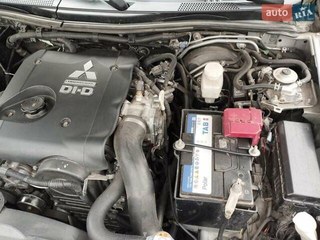 Серый Мицубиси Паджеро Спорт, объемом двигателя 2.5 л и пробегом 120 тыс. км за 16600 $, фото 3 на Automoto.ua