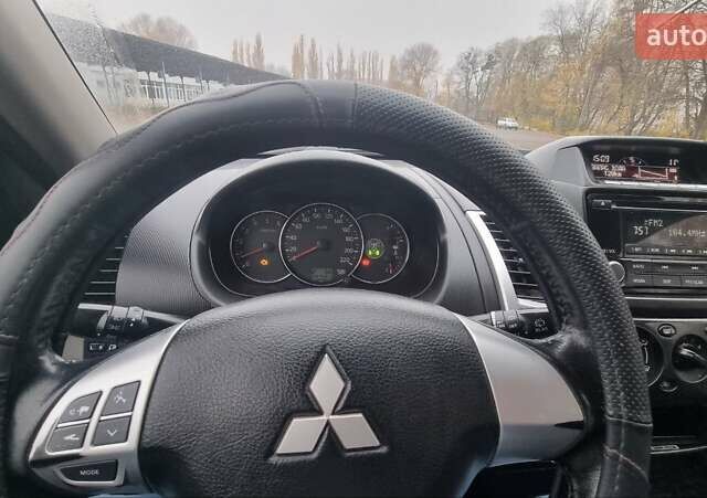 Серый Мицубиси Паджеро Спорт, объемом двигателя 2.48 л и пробегом 287 тыс. км за 13200 $, фото 17 на Automoto.ua