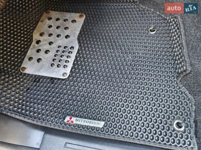 Серый Мицубиси Паджеро Спорт, объемом двигателя 2.44 л и пробегом 197 тыс. км за 26700 $, фото 14 на Automoto.ua