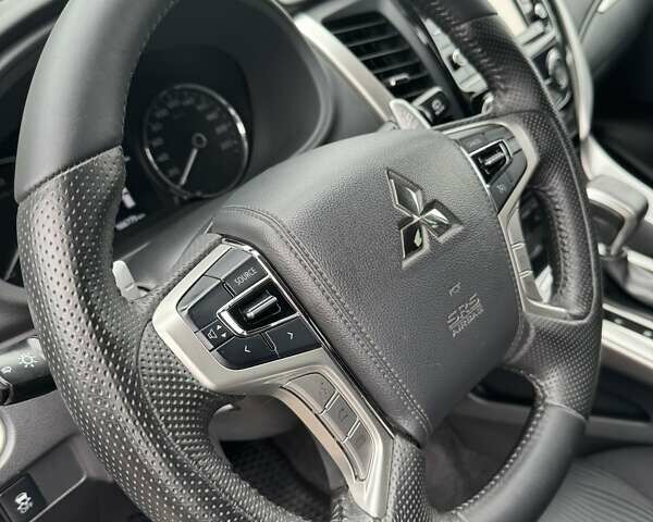 Сірий Міцубісі Паджеро Спорт, об'ємом двигуна 2.44 л та пробігом 170 тис. км за 23000 $, фото 11 на Automoto.ua