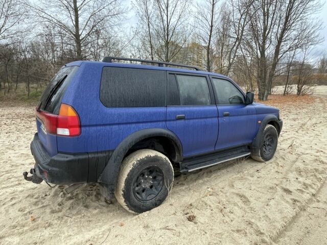 Синий Мицубиси Паджеро Спорт, объемом двигателя 2.5 л и пробегом 320 тыс. км за 4400 $, фото 3 на Automoto.ua