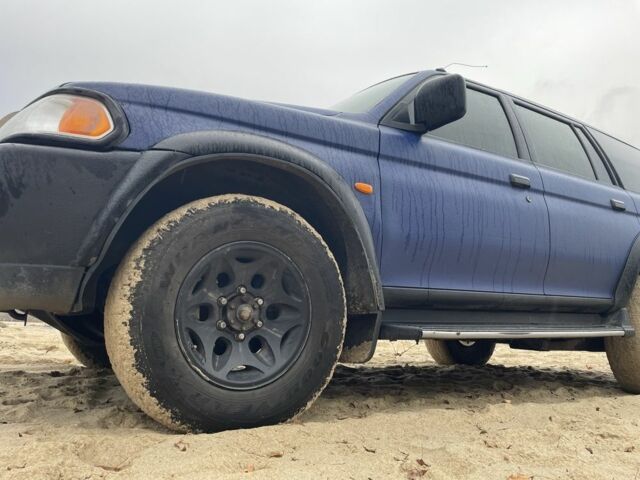 Синий Мицубиси Паджеро Спорт, объемом двигателя 2.5 л и пробегом 320 тыс. км за 4400 $, фото 1 на Automoto.ua