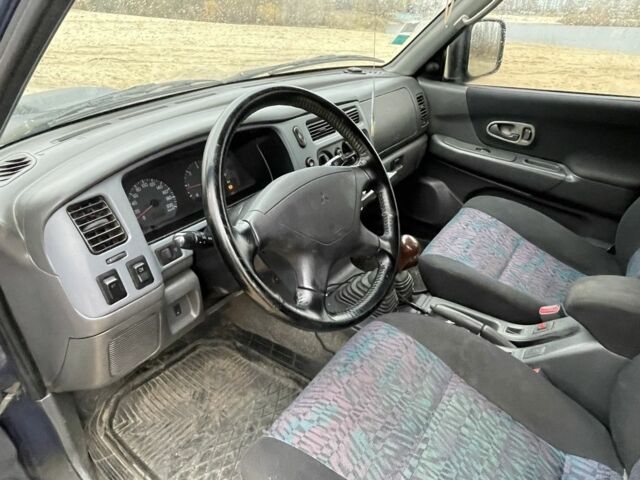 Синий Мицубиси Паджеро Спорт, объемом двигателя 2.5 л и пробегом 320 тыс. км за 4400 $, фото 10 на Automoto.ua