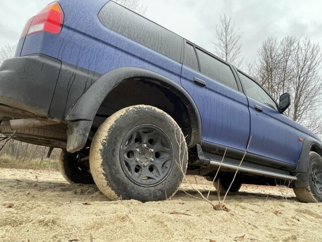 Синий Мицубиси Паджеро Спорт, объемом двигателя 2.5 л и пробегом 320 тыс. км за 4400 $, фото 4 на Automoto.ua