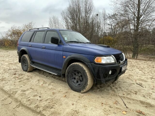 Синий Мицубиси Паджеро Спорт, объемом двигателя 2.5 л и пробегом 320 тыс. км за 4400 $, фото 5 на Automoto.ua