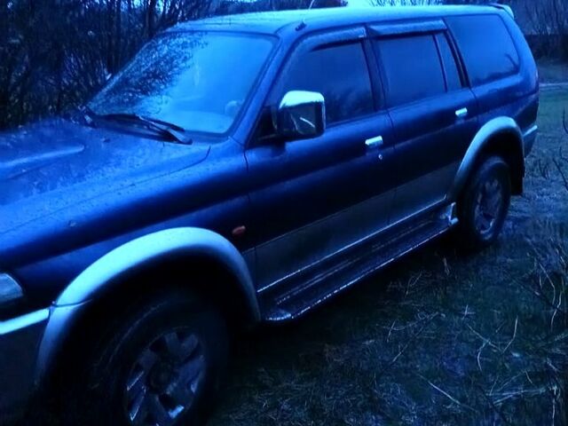 Синий Мицубиси Паджеро Спорт, объемом двигателя 2.5 л и пробегом 310 тыс. км за 4500 $, фото 5 на Automoto.ua