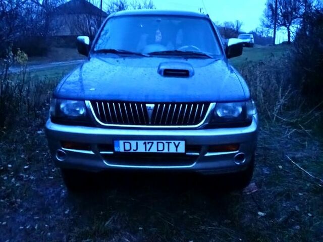 Синий Мицубиси Паджеро Спорт, объемом двигателя 2.5 л и пробегом 310 тыс. км за 4500 $, фото 4 на Automoto.ua