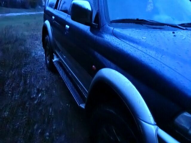 Синий Мицубиси Паджеро Спорт, объемом двигателя 2.5 л и пробегом 310 тыс. км за 4500 $, фото 2 на Automoto.ua