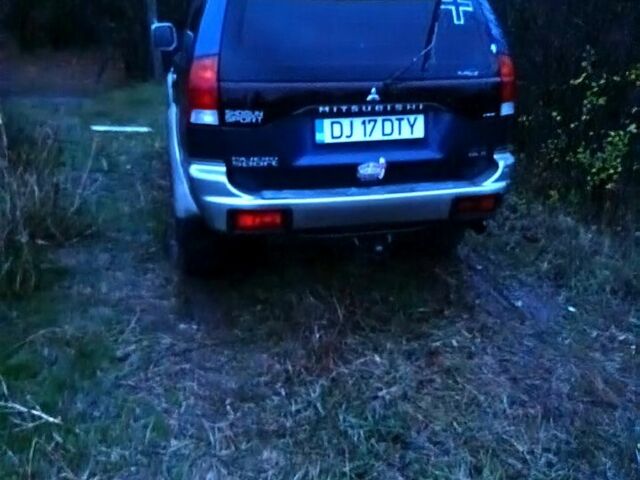 Синий Мицубиси Паджеро Спорт, объемом двигателя 2.5 л и пробегом 310 тыс. км за 4500 $, фото 3 на Automoto.ua