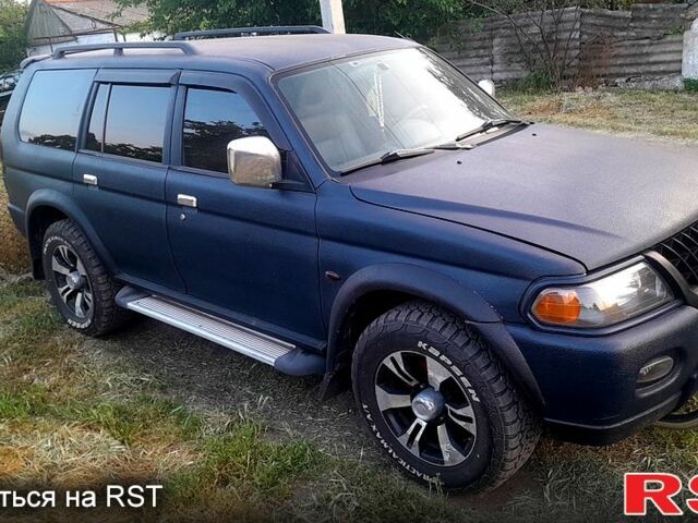 Синий Мицубиси Паджеро Спорт, объемом двигателя 3 л и пробегом 300 тыс. км за 7500 $, фото 5 на Automoto.ua