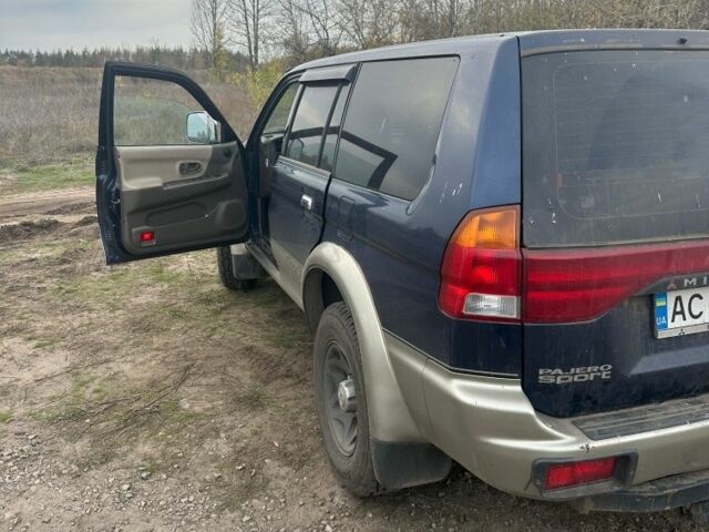 Синій Міцубісі Паджеро Спорт, об'ємом двигуна 2 л та пробігом 256 тис. км за 6000 $, фото 2 на Automoto.ua