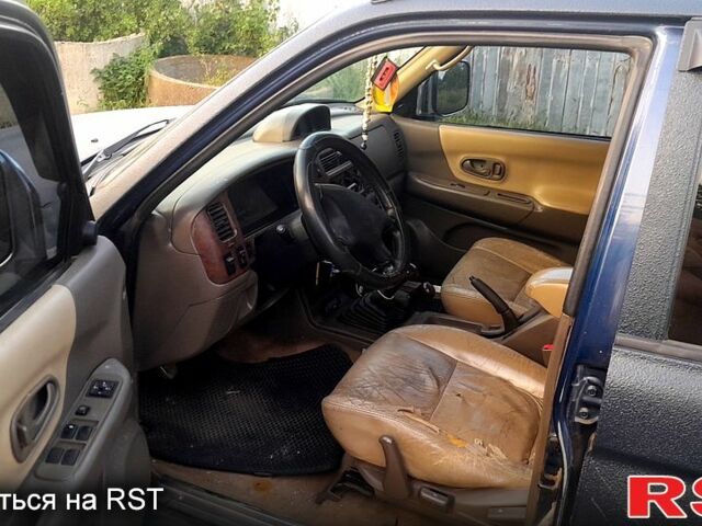 Синій Міцубісі Паджеро Спорт, об'ємом двигуна 3 л та пробігом 300 тис. км за 7500 $, фото 1 на Automoto.ua