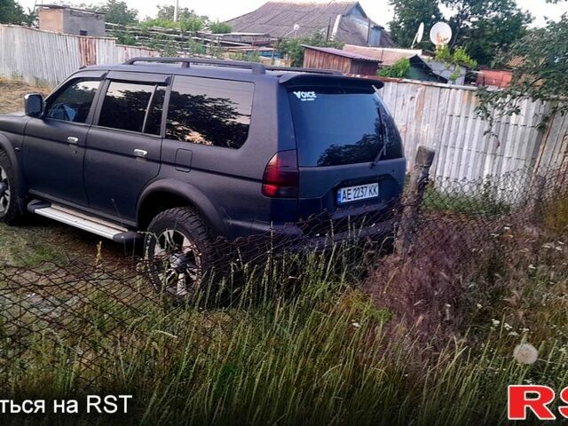 Синий Мицубиси Паджеро Спорт, объемом двигателя 3 л и пробегом 300 тыс. км за 7500 $, фото 3 на Automoto.ua