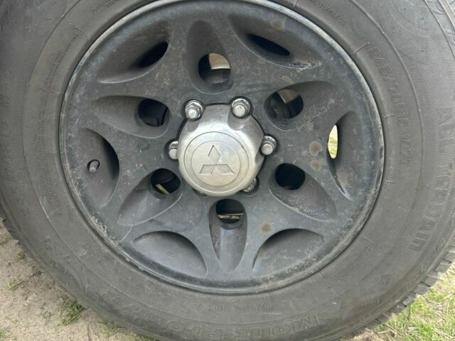 Синій Міцубісі Паджеро Спорт, об'ємом двигуна 2 л та пробігом 256 тис. км за 6000 $, фото 7 на Automoto.ua