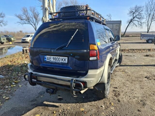Синій Міцубісі Паджеро Спорт, об'ємом двигуна 2.5 л та пробігом 380 тис. км за 7999 $, фото 3 на Automoto.ua