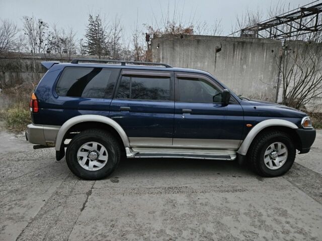 Синий Мицубиси Паджеро Спорт, объемом двигателя 3 л и пробегом 251 тыс. км за 5200 $, фото 5 на Automoto.ua