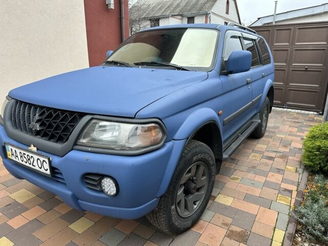 Синий Мицубиси Паджеро Спорт, объемом двигателя 3 л и пробегом 332 тыс. км за 6200 $, фото 1 на Automoto.ua