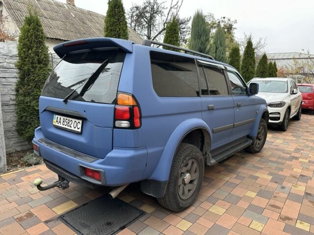 Синий Мицубиси Паджеро Спорт, объемом двигателя 3 л и пробегом 332 тыс. км за 6200 $, фото 3 на Automoto.ua