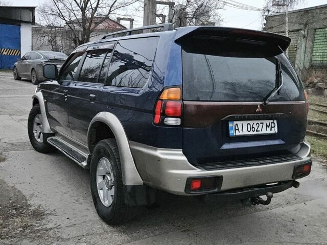 Синий Мицубиси Паджеро Спорт, объемом двигателя 3 л и пробегом 251 тыс. км за 5200 $, фото 1 на Automoto.ua
