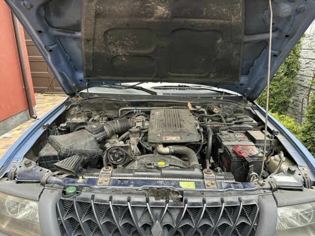 Синий Мицубиси Паджеро Спорт, объемом двигателя 3 л и пробегом 332 тыс. км за 6200 $, фото 17 на Automoto.ua