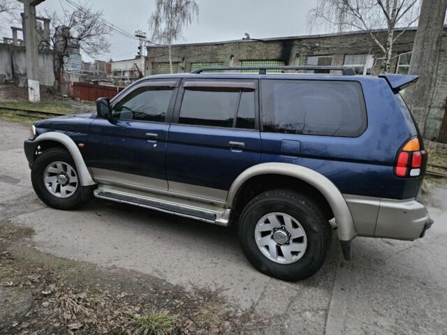 Синий Мицубиси Паджеро Спорт, объемом двигателя 3 л и пробегом 251 тыс. км за 5200 $, фото 4 на Automoto.ua