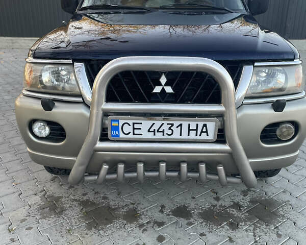 Синий Мицубиси Паджеро Спорт, объемом двигателя 2.97 л и пробегом 500 тыс. км за 5900 $, фото 1 на Automoto.ua