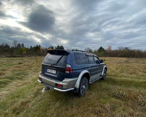 Синій Міцубісі Паджеро Спорт, об'ємом двигуна 3 л та пробігом 344 тис. км за 6800 $, фото 3 на Automoto.ua