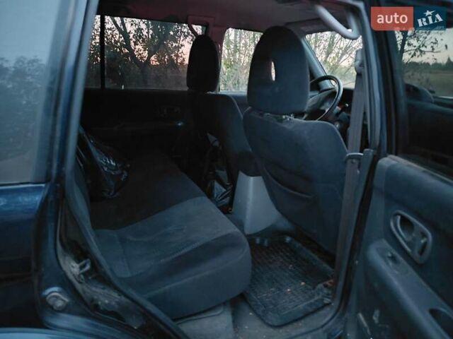 Синий Мицубиси Паджеро Спорт, объемом двигателя 2.5 л и пробегом 373 тыс. км за 4900 $, фото 7 на Automoto.ua
