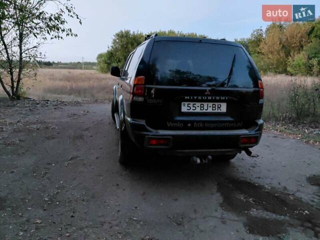Синий Мицубиси Паджеро Спорт, объемом двигателя 2.5 л и пробегом 373 тыс. км за 4900 $, фото 3 на Automoto.ua