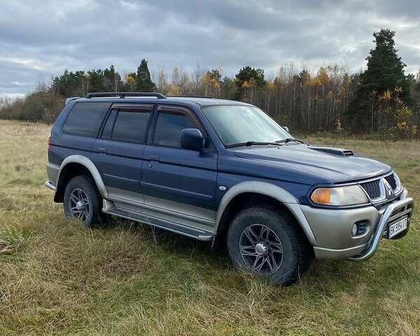 Синій Міцубісі Паджеро Спорт, об'ємом двигуна 3 л та пробігом 344 тис. км за 6800 $, фото 6 на Automoto.ua