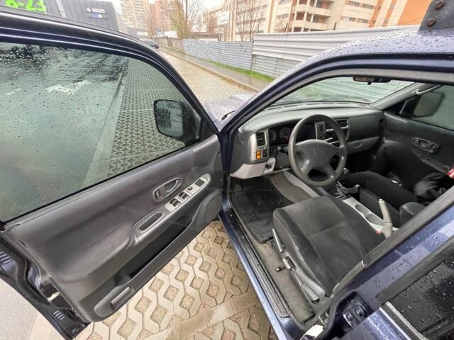 Синий Мицубиси Паджеро Спорт, объемом двигателя 2.5 л и пробегом 169 тыс. км за 8200 $, фото 11 на Automoto.ua