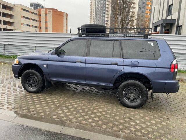 Синий Мицубиси Паджеро Спорт, объемом двигателя 2.5 л и пробегом 169 тыс. км за 8200 $, фото 3 на Automoto.ua