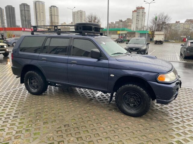 Синий Мицубиси Паджеро Спорт, объемом двигателя 2.5 л и пробегом 169 тыс. км за 8200 $, фото 1 на Automoto.ua