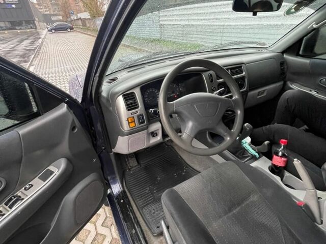 Синий Мицубиси Паджеро Спорт, объемом двигателя 2.5 л и пробегом 169 тыс. км за 8200 $, фото 6 на Automoto.ua