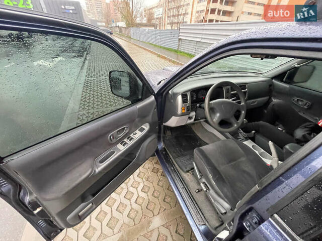 Синій Міцубісі Паджеро Спорт, об'ємом двигуна 2.5 л та пробігом 169 тис. км за 8200 $, фото 9 на Automoto.ua