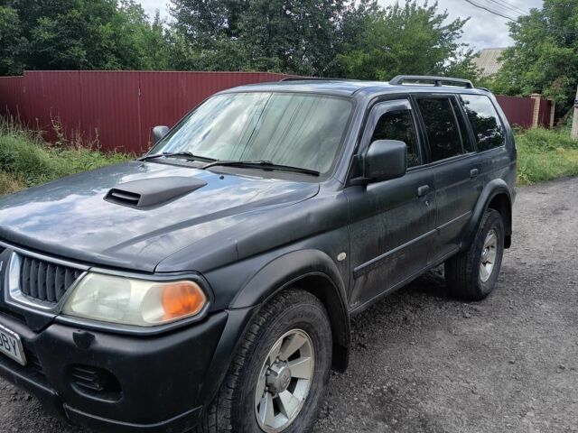 Синий Мицубиси Паджеро Спорт, объемом двигателя 2.5 л и пробегом 300 тыс. км за 4500 $, фото 2 на Automoto.ua