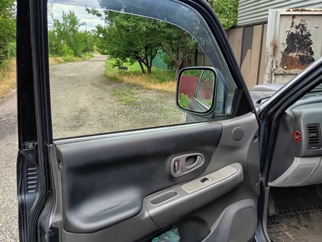 Синий Мицубиси Паджеро Спорт, объемом двигателя 2.5 л и пробегом 300 тыс. км за 4500 $, фото 9 на Automoto.ua