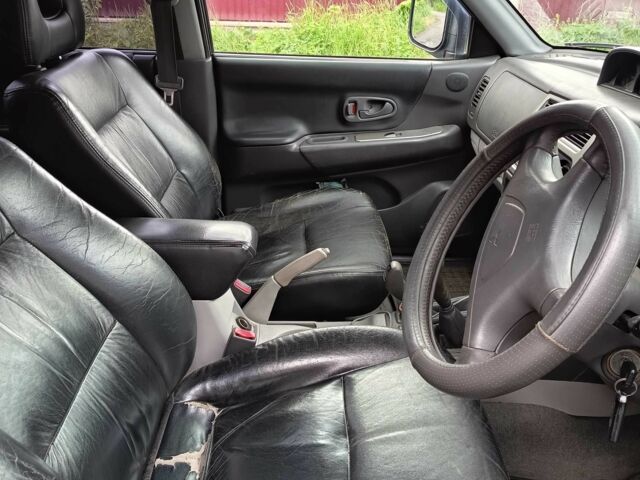 Синий Мицубиси Паджеро Спорт, объемом двигателя 2.5 л и пробегом 300 тыс. км за 4500 $, фото 5 на Automoto.ua