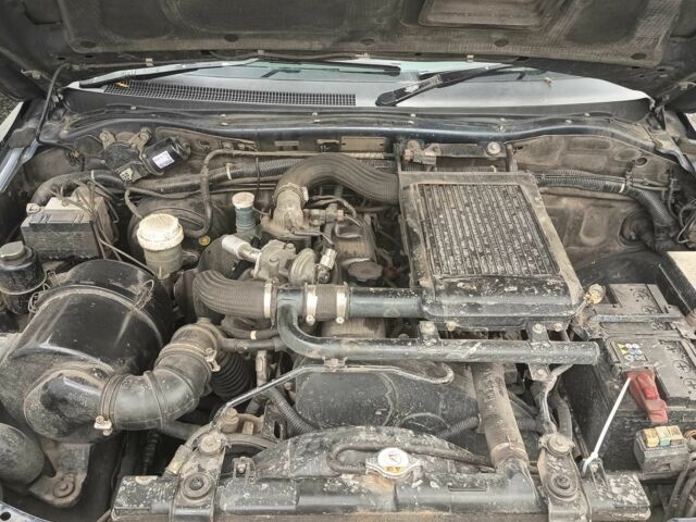 Синий Мицубиси Паджеро Спорт, объемом двигателя 2.5 л и пробегом 300 тыс. км за 4500 $, фото 4 на Automoto.ua