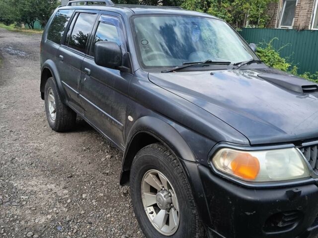 Синий Мицубиси Паджеро Спорт, объемом двигателя 2.5 л и пробегом 300 тыс. км за 4500 $, фото 1 на Automoto.ua