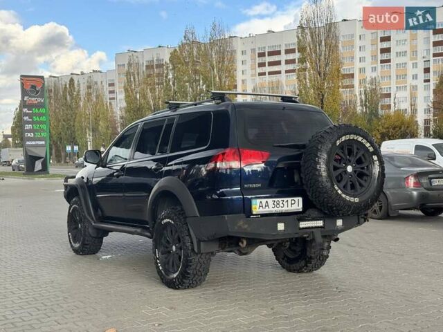 Синій Міцубісі Паджеро Спорт, об'ємом двигуна 2.48 л та пробігом 168 тис. км за 19999 $, фото 11 на Automoto.ua
