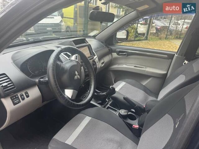 Синій Міцубісі Паджеро Спорт, об'ємом двигуна 2.5 л та пробігом 160 тис. км за 13900 $, фото 17 на Automoto.ua