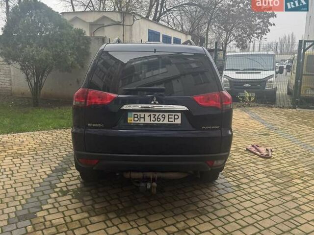 Синій Міцубісі Паджеро Спорт, об'ємом двигуна 2.5 л та пробігом 160 тис. км за 13900 $, фото 7 на Automoto.ua