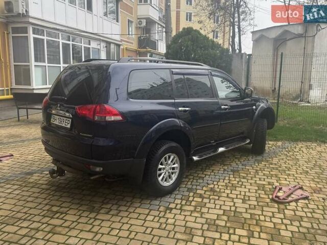 Синій Міцубісі Паджеро Спорт, об'ємом двигуна 2.5 л та пробігом 160 тис. км за 13900 $, фото 6 на Automoto.ua