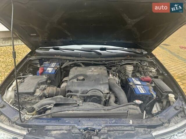 Синій Міцубісі Паджеро Спорт, об'ємом двигуна 2.5 л та пробігом 160 тис. км за 13900 $, фото 19 на Automoto.ua