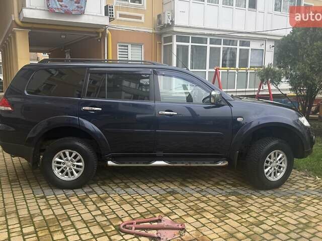 Синій Міцубісі Паджеро Спорт, об'ємом двигуна 2.5 л та пробігом 160 тис. км за 13900 $, фото 5 на Automoto.ua