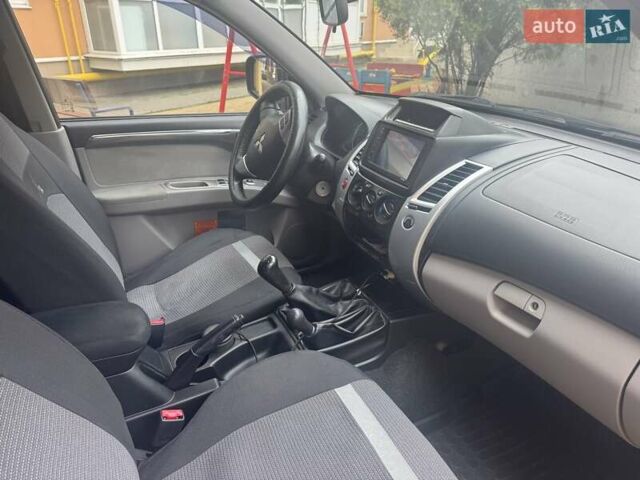 Синій Міцубісі Паджеро Спорт, об'ємом двигуна 2.5 л та пробігом 160 тис. км за 13900 $, фото 16 на Automoto.ua